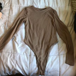 Nude long sleeve body suit